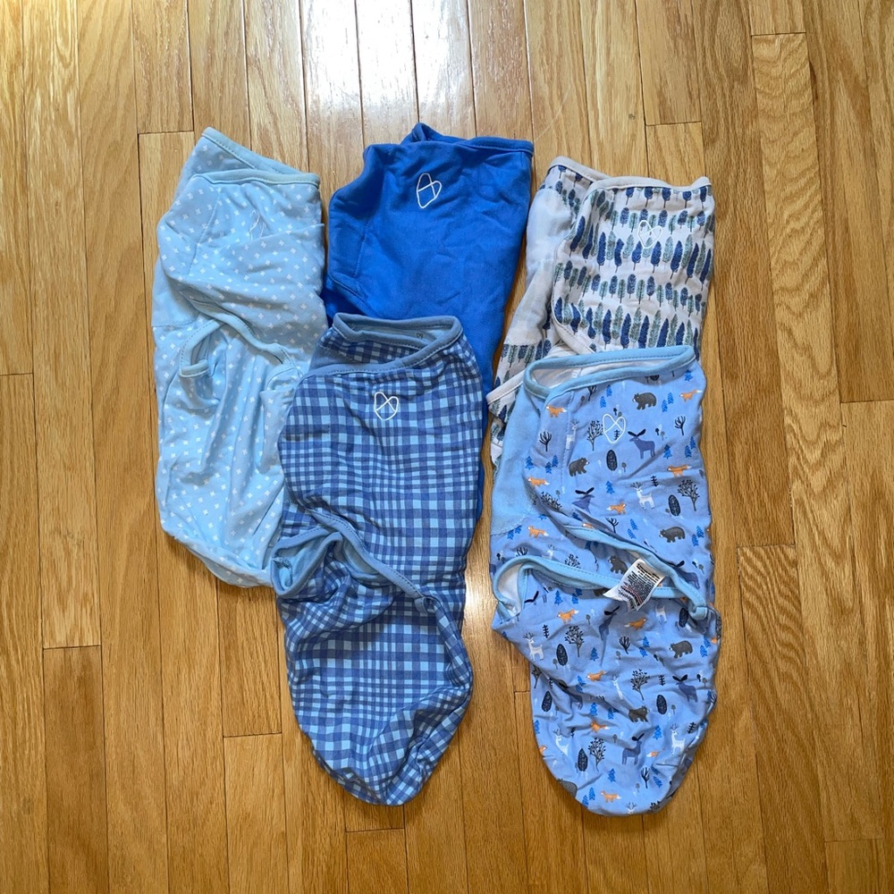 SwaddleMe brand swaddle. Size small(7-14 lbs). NWOT. Blue woodland.